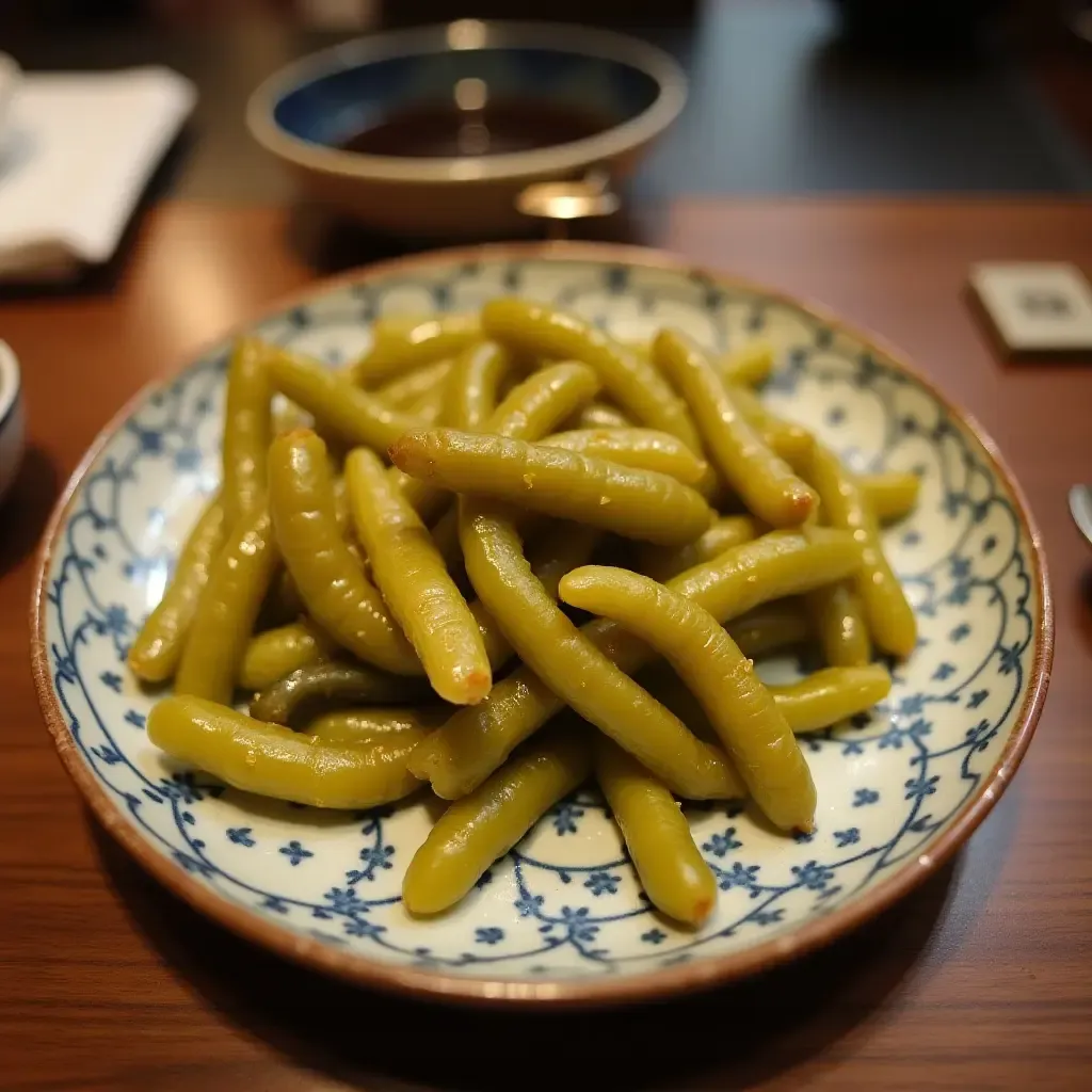 a photo of a Japanese meal with a side of tangy pickles on a ceramic plate.