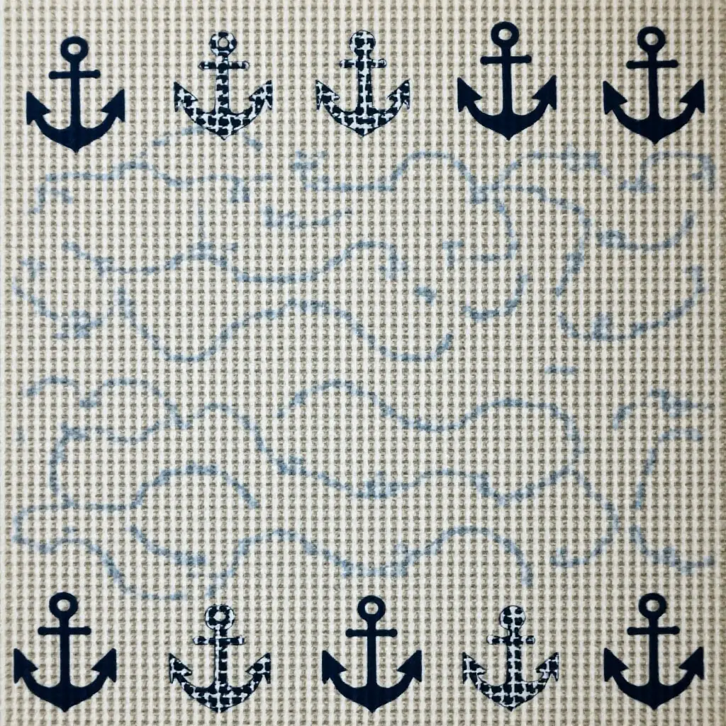 a photo of a nautical-themed rug with anchors and waves